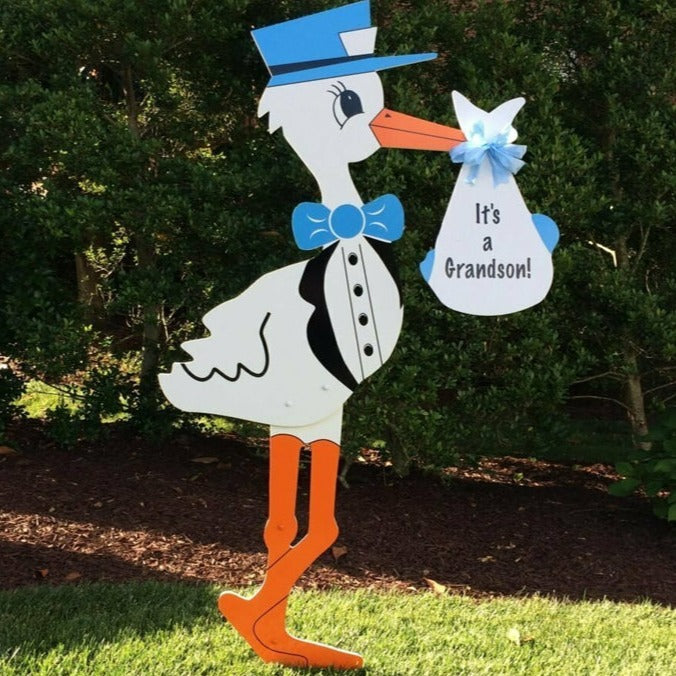 Blue stork with generic "It's a grandson!" message on bundle